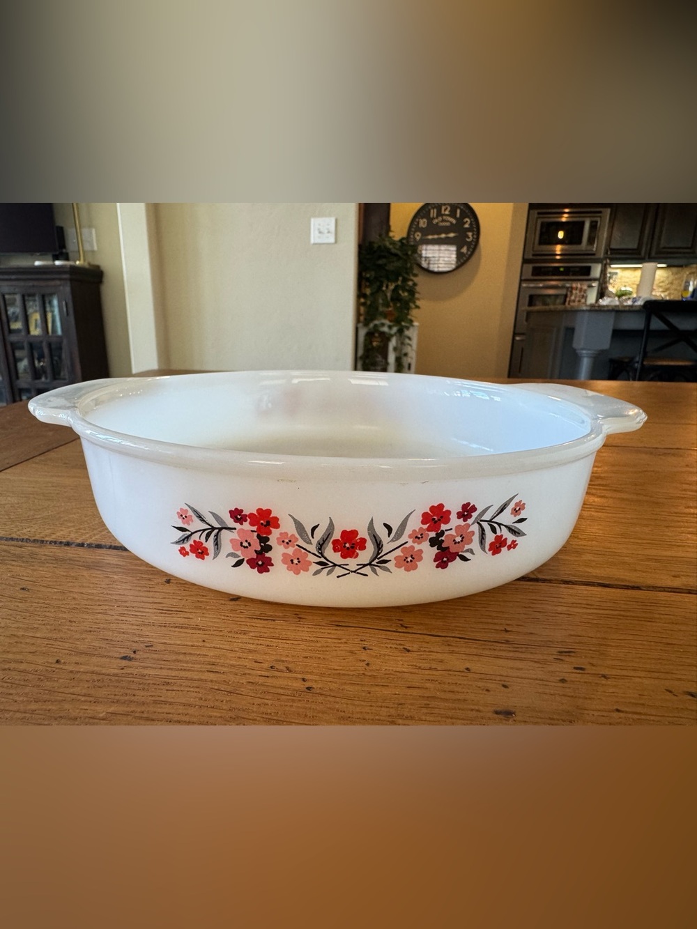 Vintage Fire King milk glass casserole dish in the Primrose pattern.